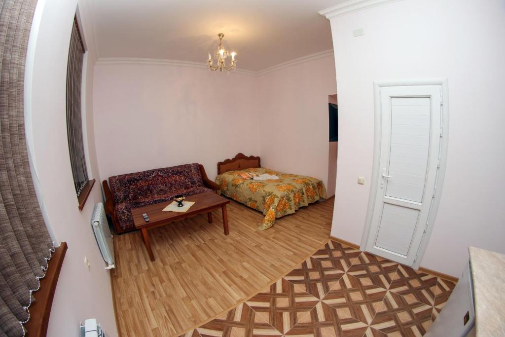 Postel nebo postele na pokoji v ubytování Vanand Guest House