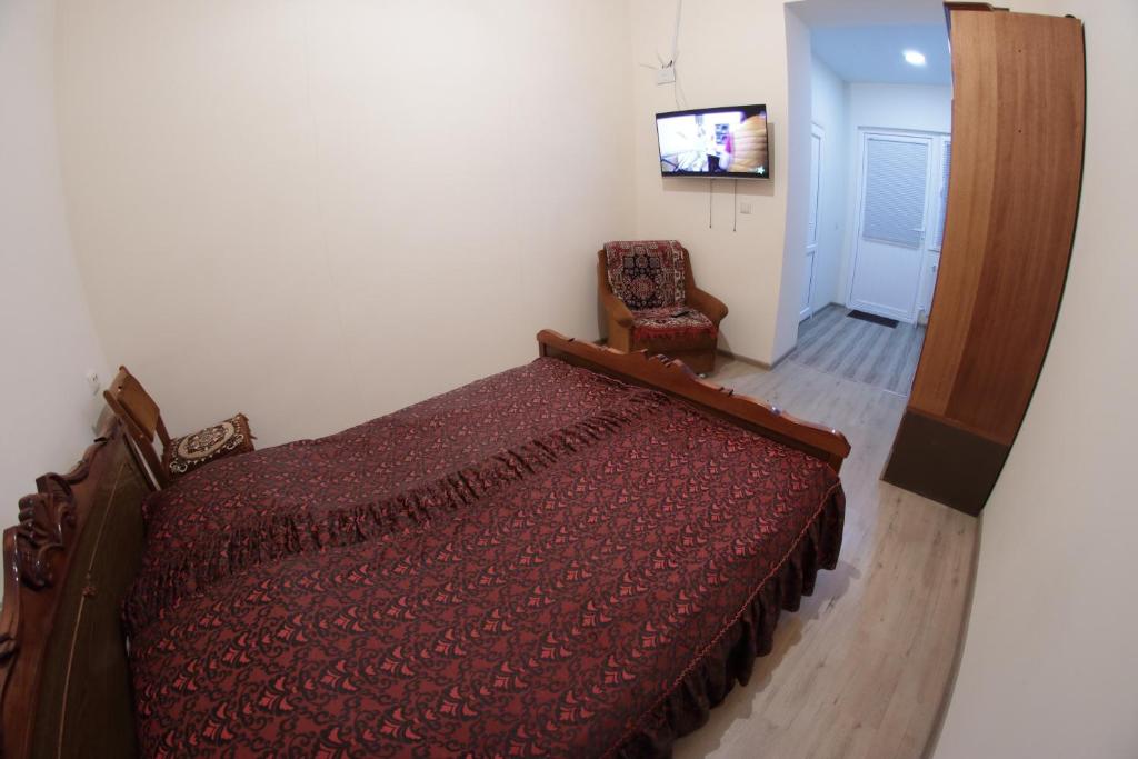 Postel nebo postele na pokoji v ubytování Vanand Guest House