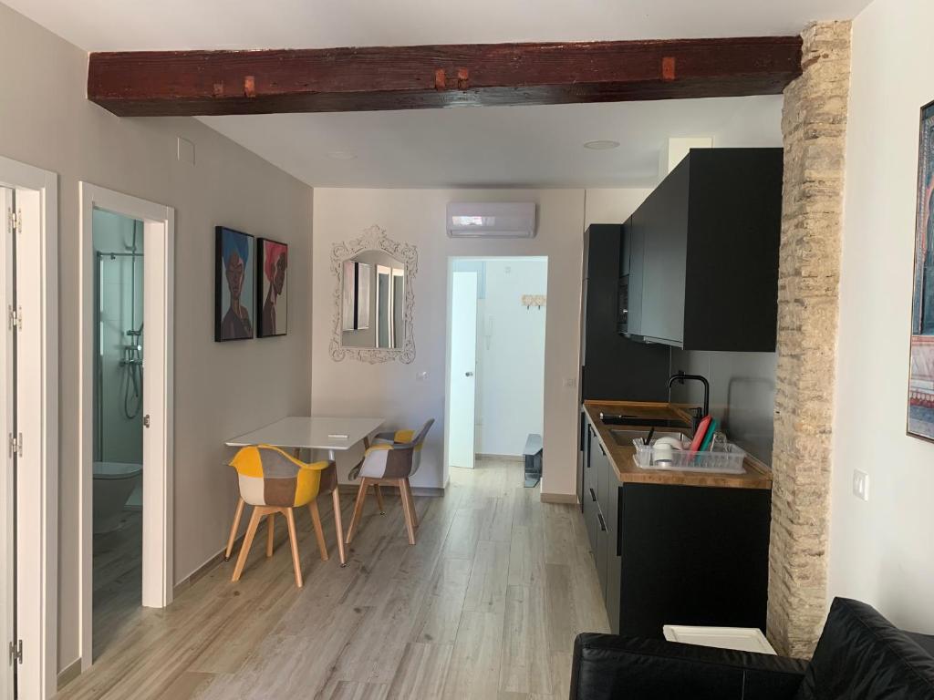 Televízia a/alebo spoločenská miestnosť v ubytovaní Apartamento Entrecatedrales