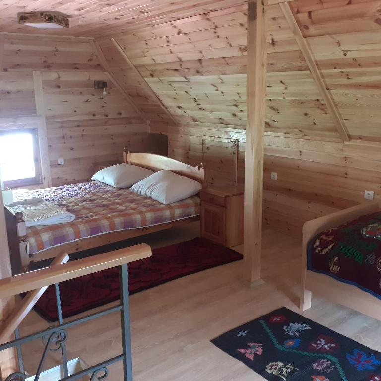 Postel nebo postele na pokoji v ubytování Kuca Karajic