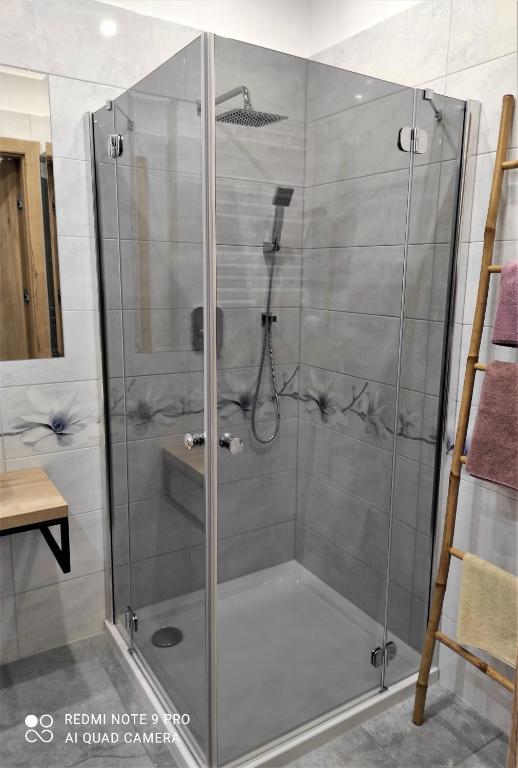 Kúpeľňa v ubytovaní MAZURSKA DAMA LUXURY APARTAMENT