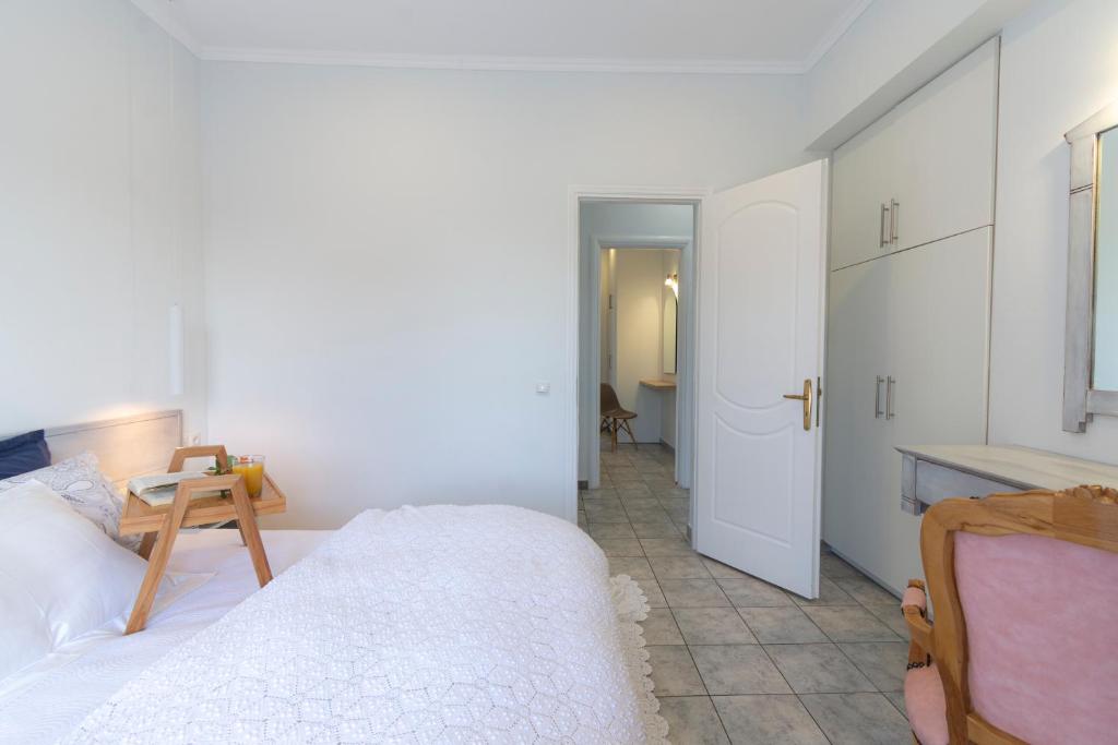 Postel nebo postele na pokoji v ubytování Villas Margaris
