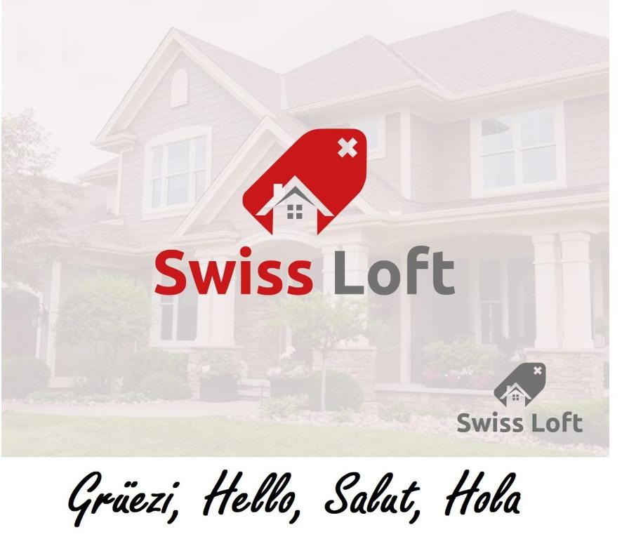 a house with a swiss lot sign in front of it at Exclusive Swiss Loft in Lütisburg
