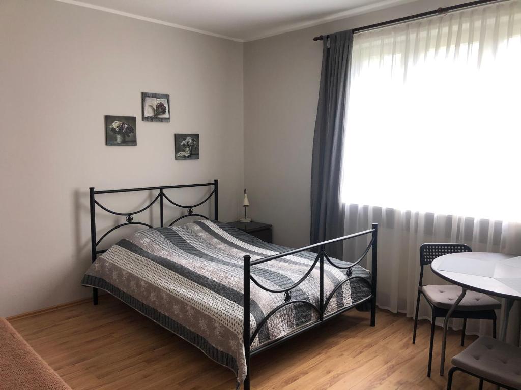 Кровать или кровати в номере Noclegi Gdańsk Pokoje Gościnne