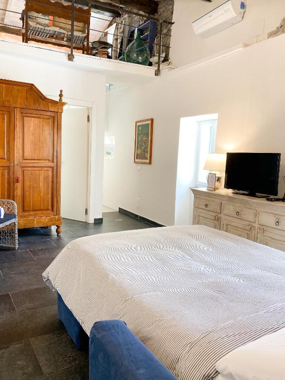 Postel nebo postele na pokoji v ubytování La Polena Camere Vernazza - Carattino Apartment