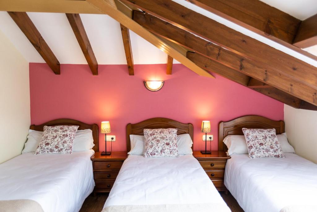 Postel nebo postele na pokoji v ubytování Hotel Rural El Caserón