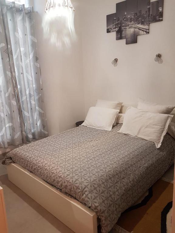 Postel nebo postele na pokoji v ubytování Ketia p