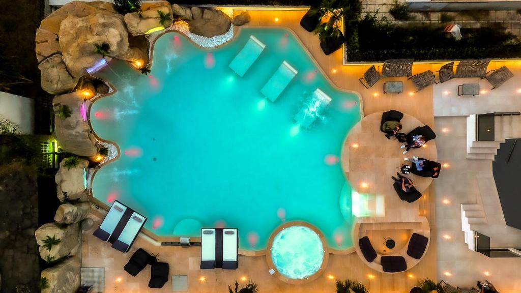 Bazén v ubytování Avaton Luxury Resort and Spa Access the Enigma - Adults Only & Kids 14 Plus- nebo v jeho okolí