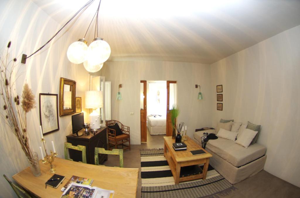Kép Appartamento Centro Città quartiere Oltrarno con una camera da letto szállásáról Firenzében a galériában