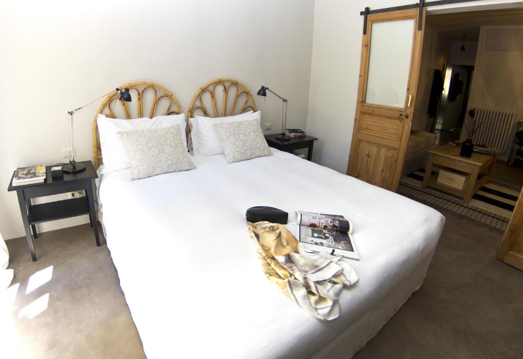 Kép Appartamento Centro Città quartiere Oltrarno con una camera da letto szállásáról Firenzében a galériában