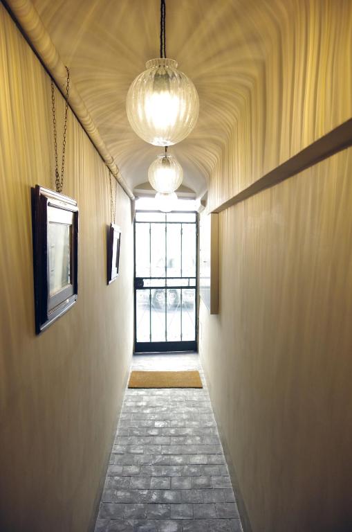 Kép Appartamento Centro Città quartiere Oltrarno con una camera da letto szállásáról Firenzében a galériában