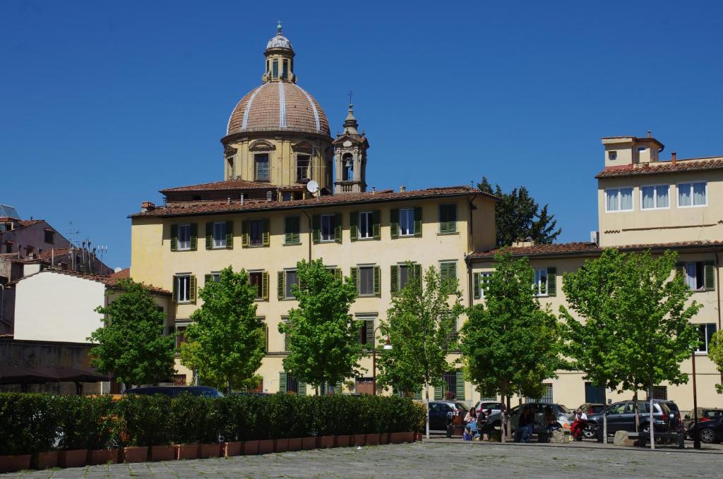 Kép Appartamento Centro Città quartiere Oltrarno con una camera da letto szállásáról Firenzében a galériában