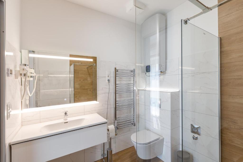 Kúpeľňa v ubytovaní La Bella Centrum Apartmanok Kék Zöld