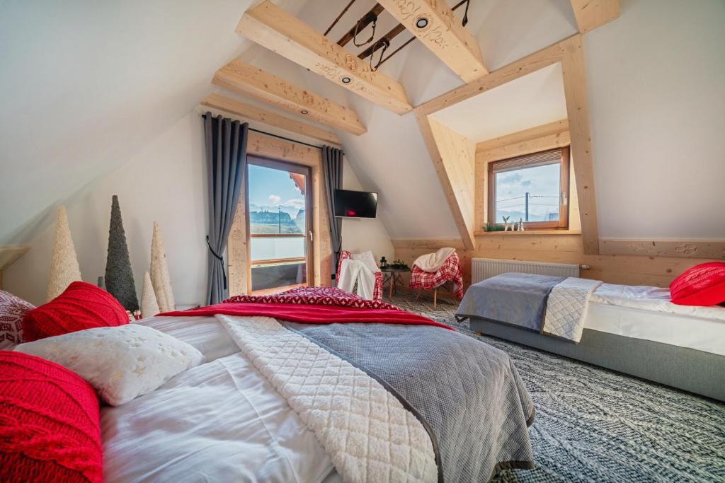 Postel nebo postele na pokoji v ubytování Chaty Misiagi - domki na wynajem