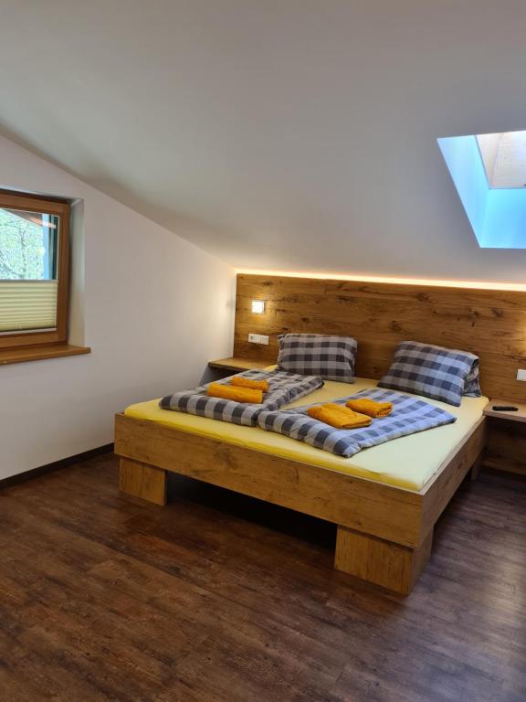 A bed or beds in a room at Haus Scheuerer