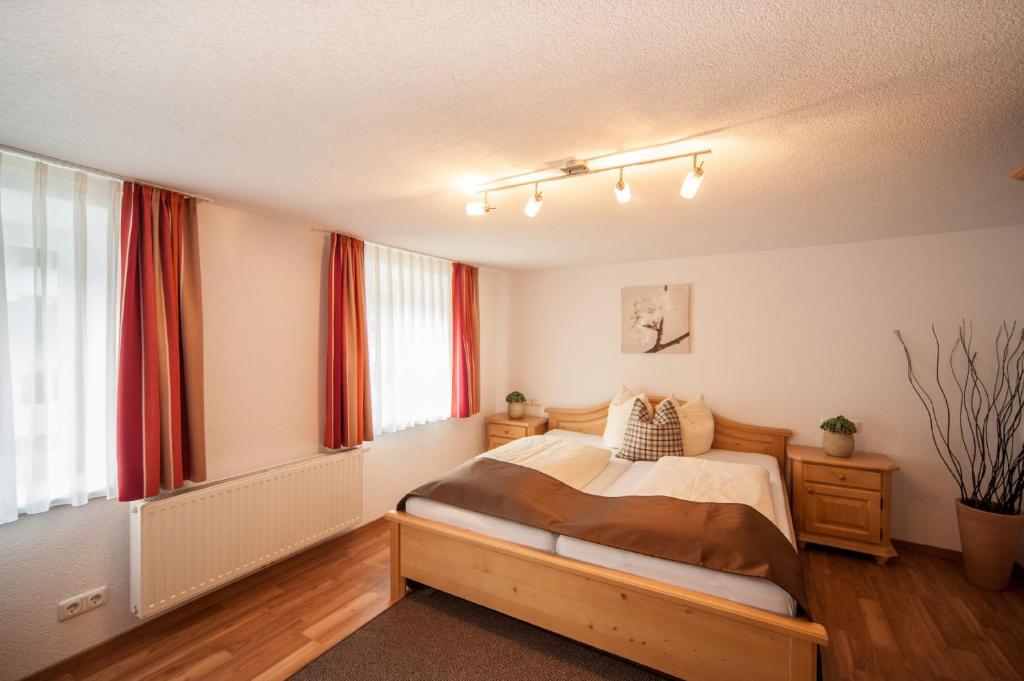 Postel nebo postele na pokoji v ubytování Ferienanlage Hechenbergerhof