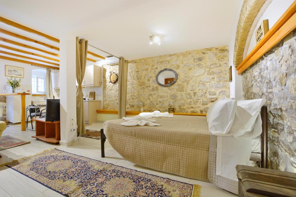 A television and/or entertainment centre at Studio in Corfu town
