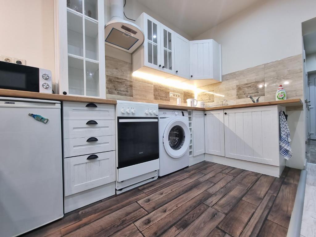 Kuchyň nebo kuchyňský kout v ubytování HIGH STREET APARTMAN