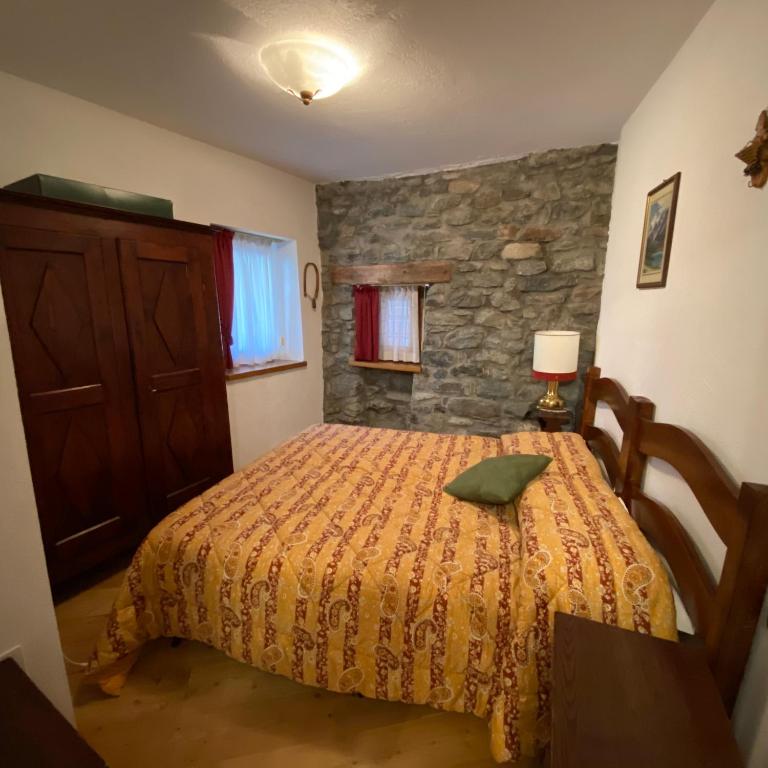 Posteľ alebo postele v izbe v ubytovaní Chalet Cretaz