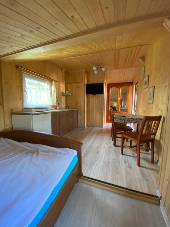 Postel nebo postele na pokoji v ubytování Przystanek Kaszuby