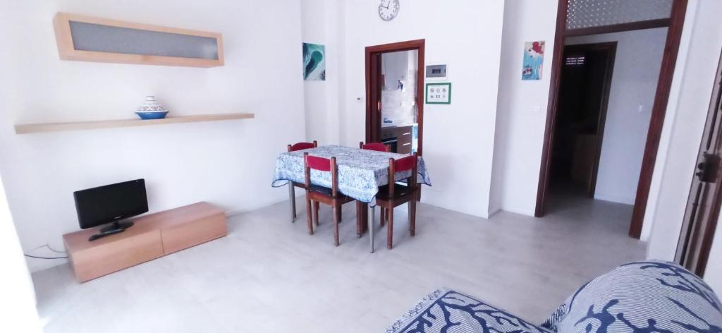 Televízia a/alebo spoločenská miestnosť v ubytovaní Casa Garbein