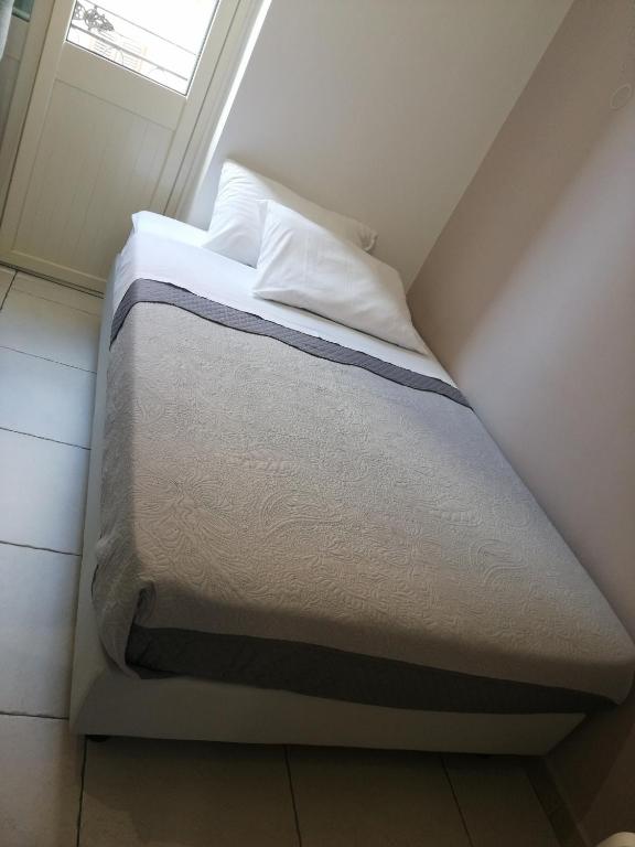 Posteľ alebo postele v izbe v ubytovaní B&B AMISTANZA