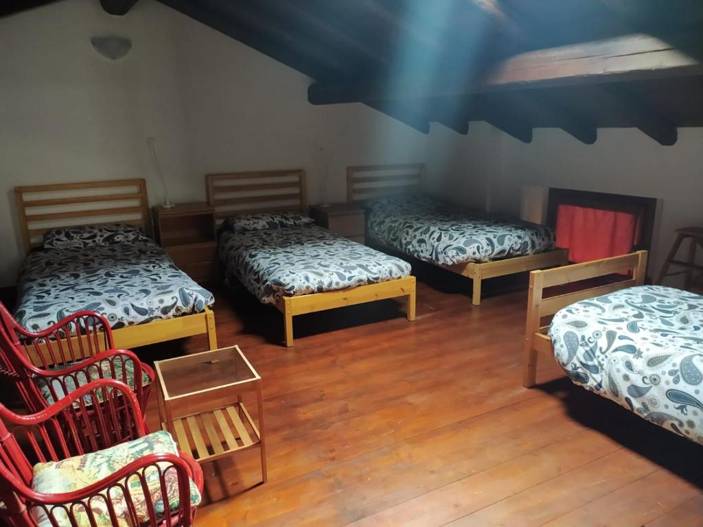 Postel nebo postele na pokoji v ubytování La corte del pane