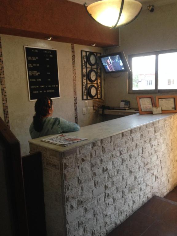 TV a/nebo společenská místnost v ubytování Hotel Xalapa