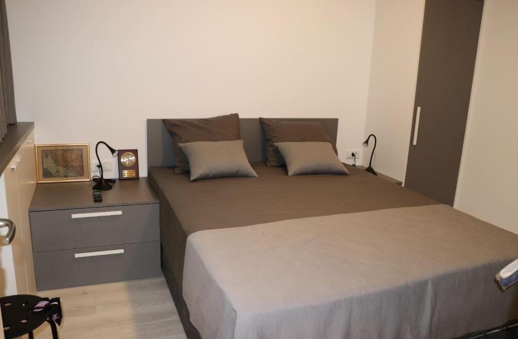 Voodi või voodid majutusasutuse Apartman Gusar toas