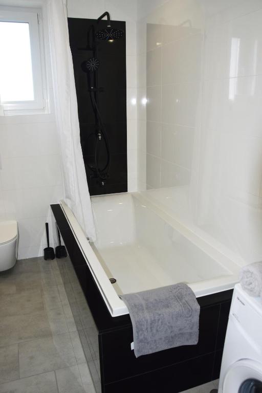 Kúpeľňa v ubytovaní Domek pod świerkami - "Apartamenty świerkowe"