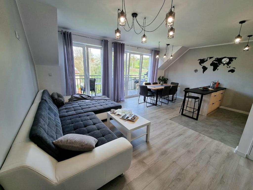 Posedenie v ubytovaní Domek pod świerkami - "Apartamenty świerkowe"