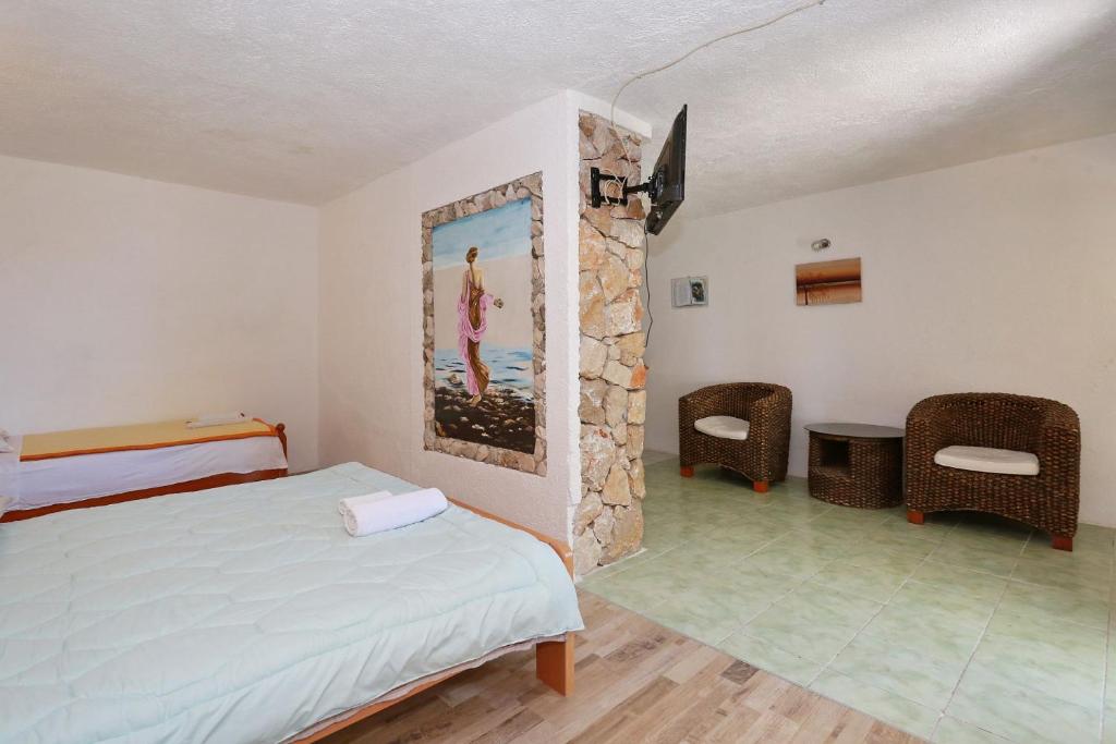 Posteľ alebo postele v izbe v ubytovaní Apartmani Stanka & Joso