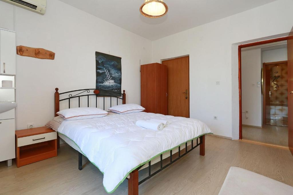 Posteľ alebo postele v izbe v ubytovaní Apartmani Stanka & Joso