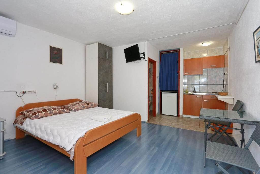 Posteľ alebo postele v izbe v ubytovaní Apartmani Stanka & Joso