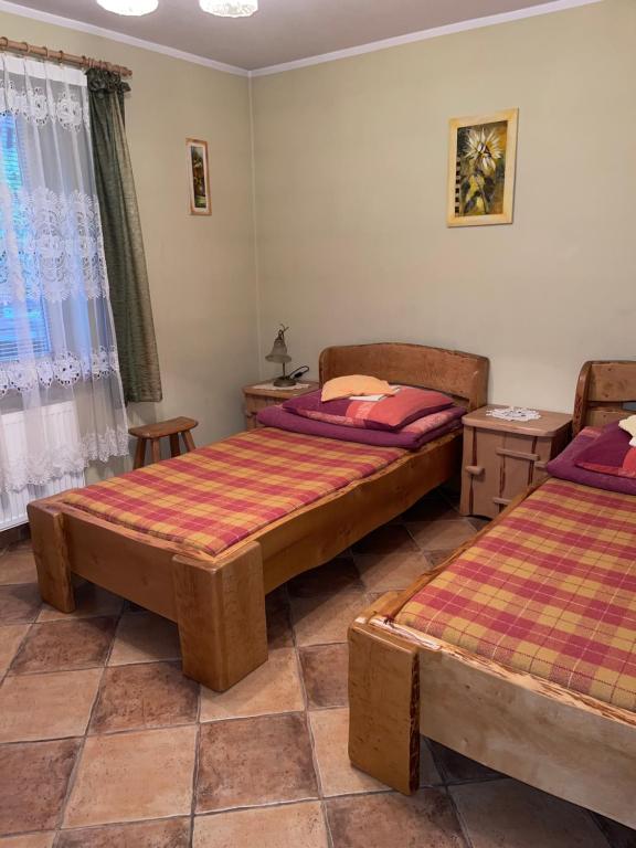 Posteľ alebo postele v izbe v ubytovaní Duży dom dla 16 osób