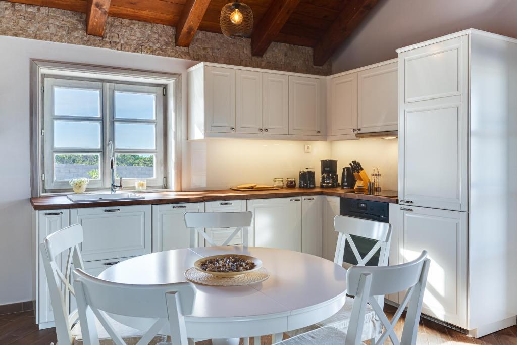 Kuchyň nebo kuchyňský kout v ubytování Stonehouse Milan