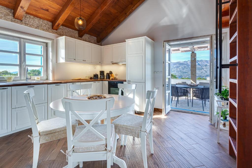 Kuchyň nebo kuchyňský kout v ubytování Stonehouse Milan