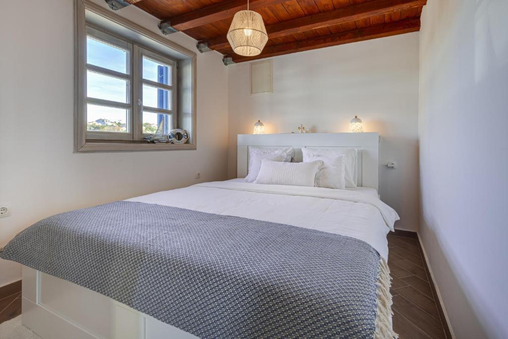 Postel nebo postele na pokoji v ubytování Stonehouse Milan
