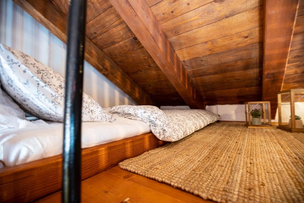 Postel nebo postele na pokoji v ubytování Stonehouse Milan