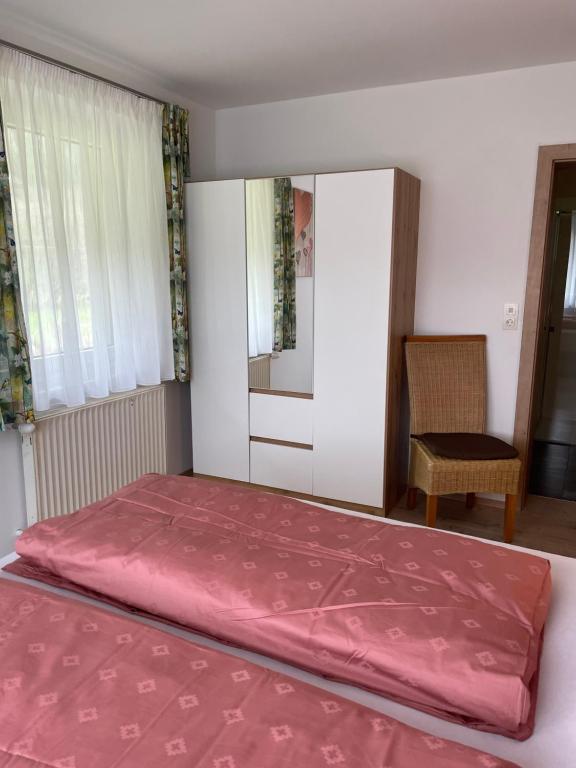 Postel nebo postele na pokoji v ubytování Ferienwohnungen Bianca Hasler - Stallbauer