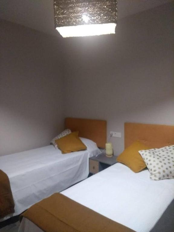 Postel nebo postele na pokoji v ubytování Casa-Grima