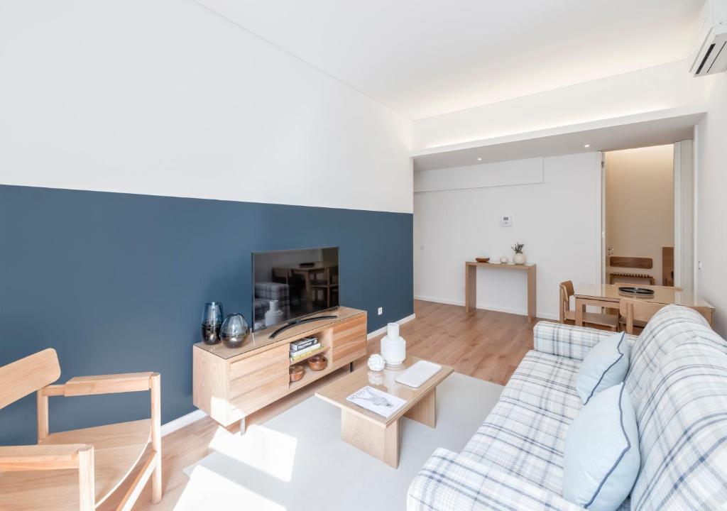 Mouzinho da Silveira Unique Apartments, by Oporto Collection - 一张双人床和一张单人床的标准公寓