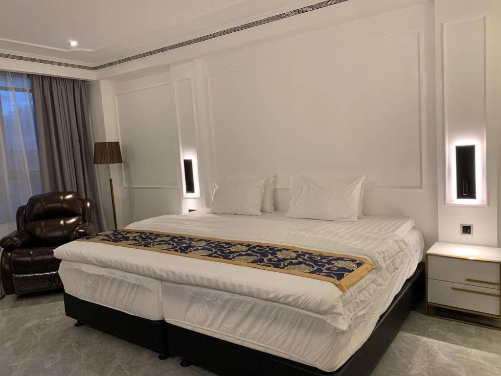 Postel nebo postele na pokoji v ubytování Hotel Seoul