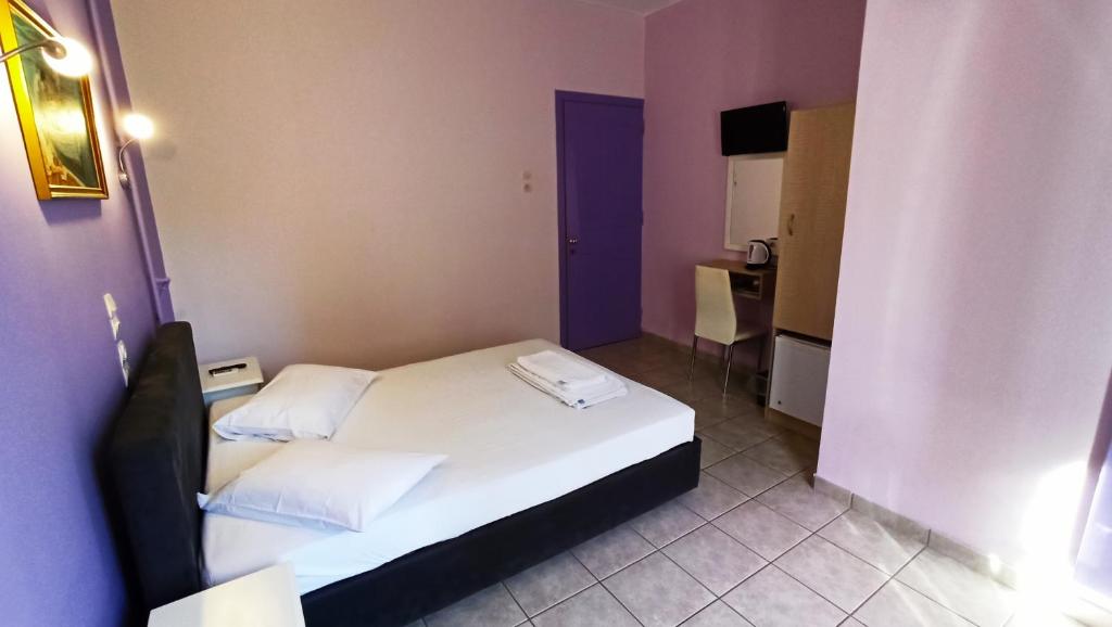 Postel nebo postele na pokoji v ubytování Hera Hotel