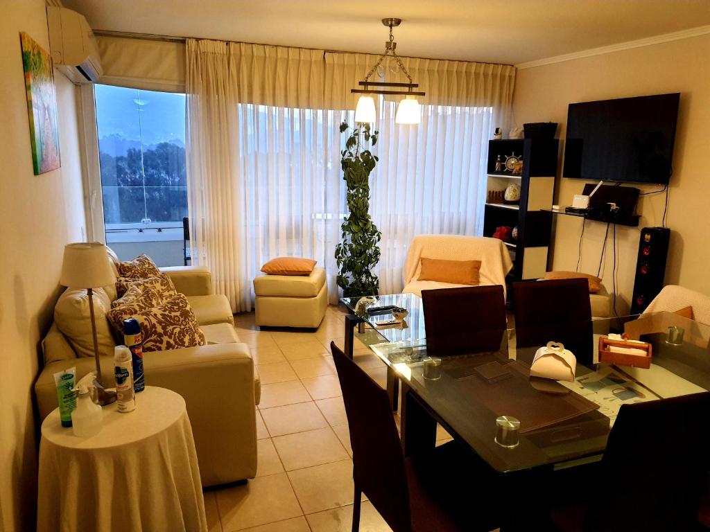 TV a/nebo společenská místnost v ubytování Departamento Lago & Mar
