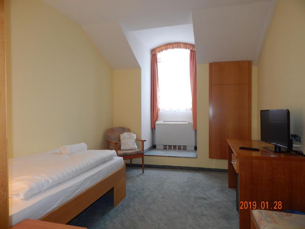 Postel nebo postele na pokoji v ubytování Panorama Hotel Noszvaj