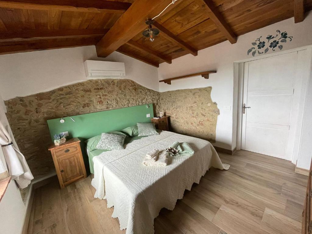 Łóżko lub łóżka w pokoju w obiekcie B&B IL VOLO