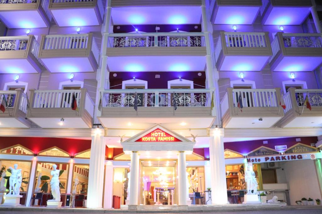 a building with purple lights on top of it at Hotel Kosta Famissi in Kalabaka