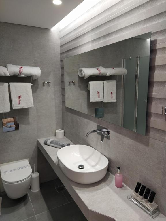 Koupelna v ubytování Minoa Hotel