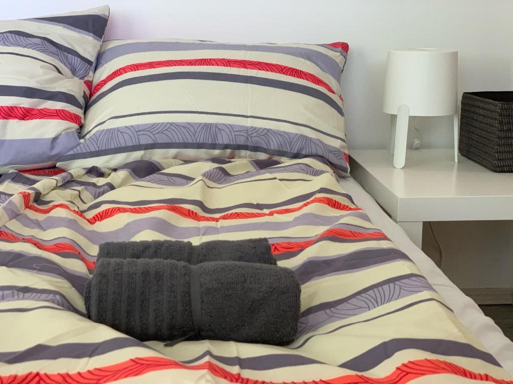 Posteľ alebo postele v izbe v ubytovaní Levendulakert Siófok Apartmanház